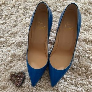 Bright blue Christian Louboutin pumps